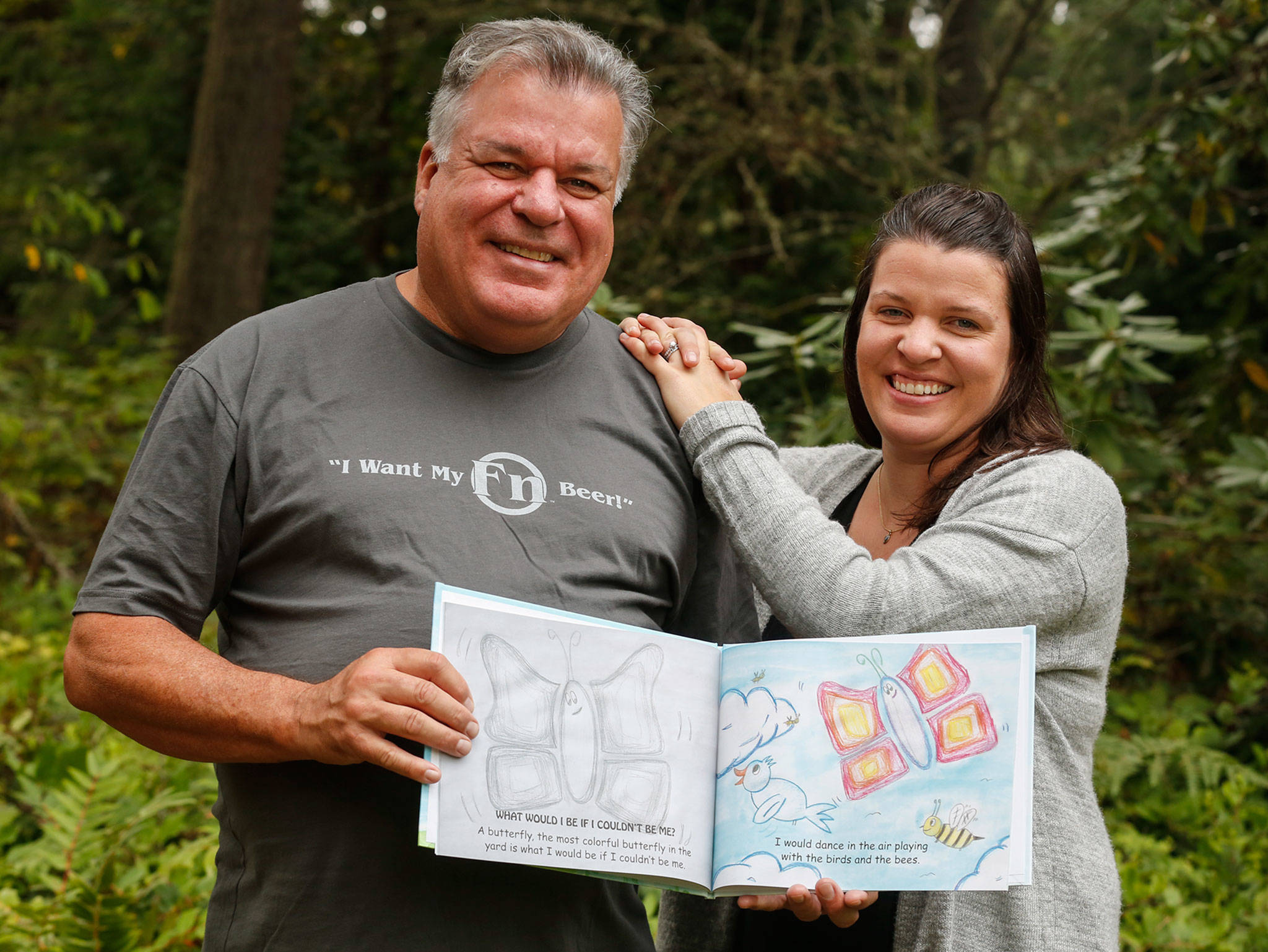 Jim Jamison and his daughter, Stephanie Schisler, wrote and illustrated “What Would I Be If I Couldn’t Be Me.” (Kevin Clark / The Herald)