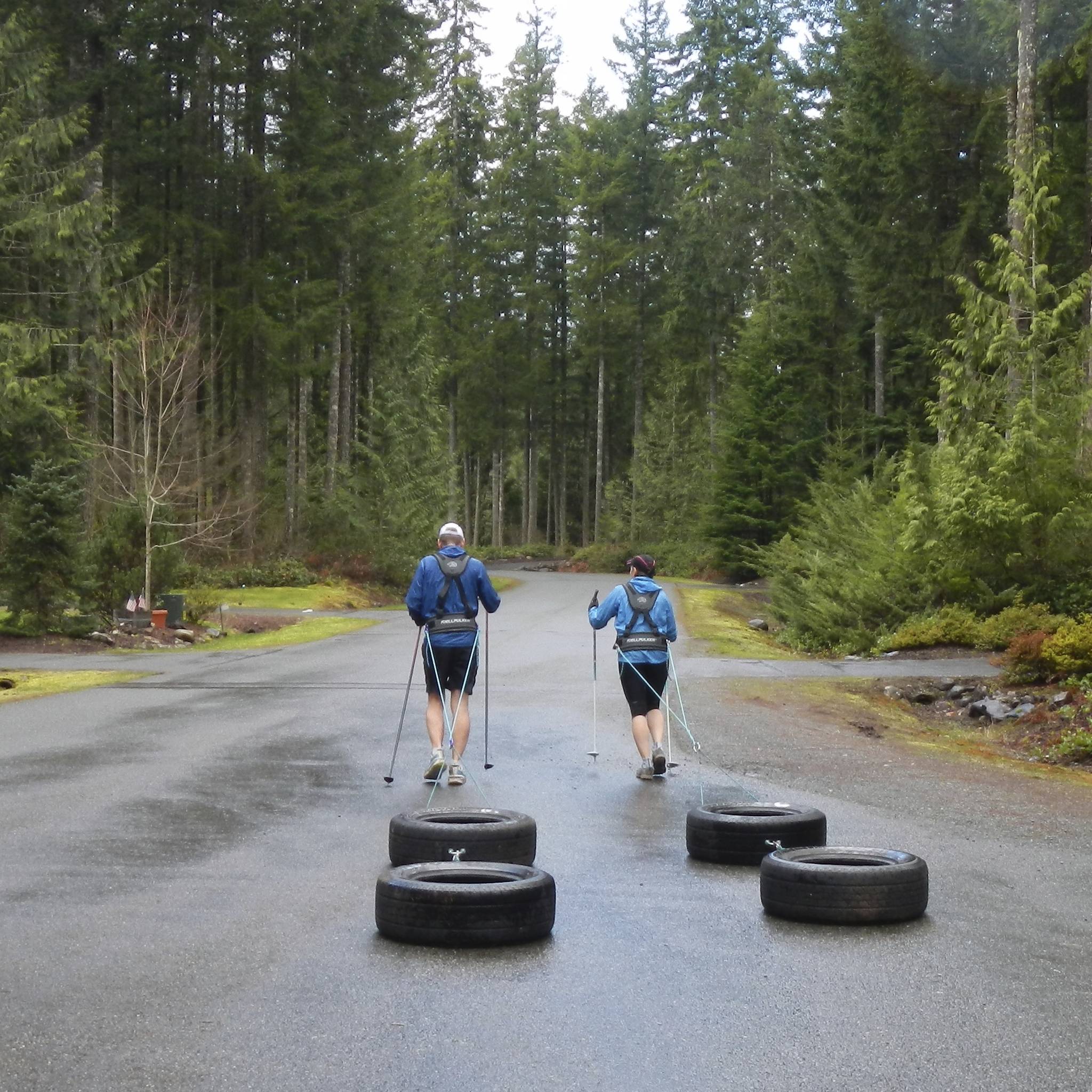 Marty and Chris Fagan training for their trek across Antarctica by pulling tires around North Bend. Contributed by Chris Fagan