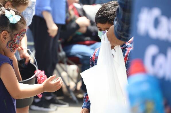 Children receive candy at Bothell’s Fourth of July Parade. Courtesy of Cascadia College.