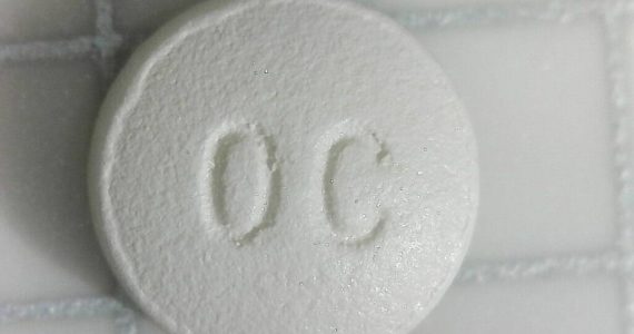 Oxycodone pill. (Photo courtesy of Wikipedia)