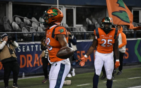 Sea Dragon WR Jordan Veasy celebrates and looks at the home fans after he scored the go ahead touchdown Feb. 23. Photos by Ben Ray/Sound Publishing