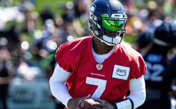 Seahawks QB Geno Smith keeps his eyes down field. (Maria Dorsten Photography)