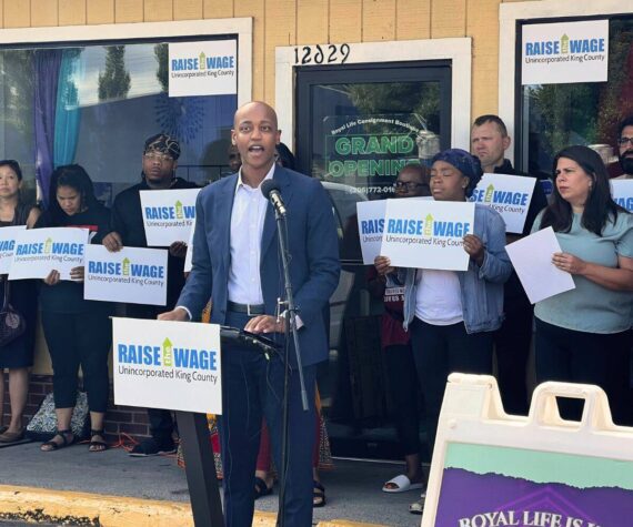 King County Councilmember Girmay Zahilay speaks at Sept. 7 press conference in Skyway with colleagues, small business owners, and union representatives in support of a minimum wage increase. (Cameron Sheppard/Sound Publishing)