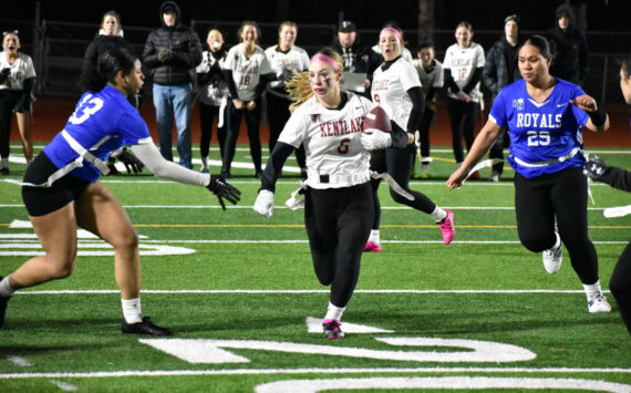 Kentlake junior Kaylee Guiles finds a hole in against Kent-Meridian. Ben Ray / The Reporter