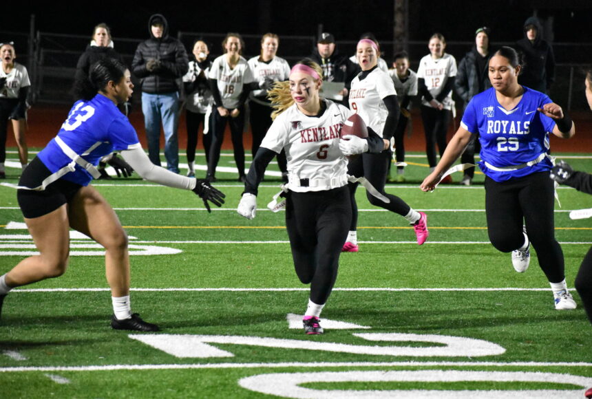 <p>Kentlake junior Kaylee Guiles finds a hole in against Kent-Meridian. Ben Ray / The Reporter</p>