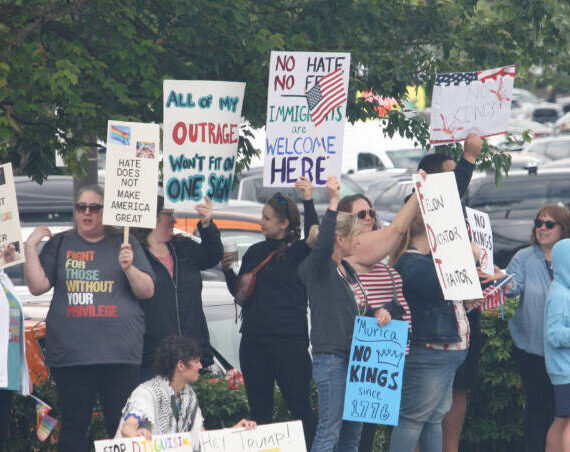 People rally June 14 in Covington during the first No Kings protest against the Trump administration. FILE PHOTO