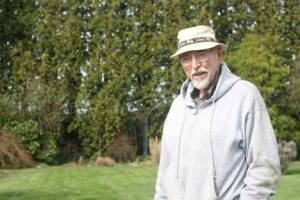 William Wood displays his garden in front of his unincorporated King County home last week.
