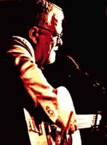 Imagine a front porch where Robert Johnson