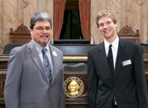 State Representative Luis Moscoso (D-Mountlake Terrace) with homeschooled student and Bothell resident Evan Olson on the floor of the House of Representatives.