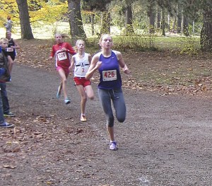 Kenmore Junior High's Amber Rose leads the pack at the USATF Region 13 Regionals at Woodland Park in Seattle earlier this month. She qualified for the national meet next weekend in Myrtle Beach