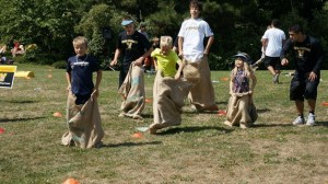 The city of Kenmore hosted potato sack races as part of the Day of Play at Rhododendron Park on Saturday.