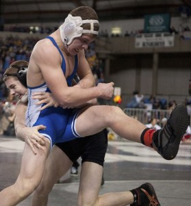 Bothell's Brandon Davidson toughs out a match last year at the Mat Classic. Davidson