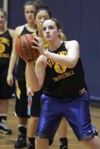Inglemoor High’s Melissa Hough aims for the hoop during practice.