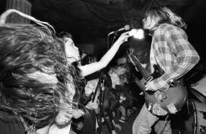 Nirvana's Kurt Cobain excites the crowd at Rajis in Hollywood in the late 1980s. Photographer Charles Peterson