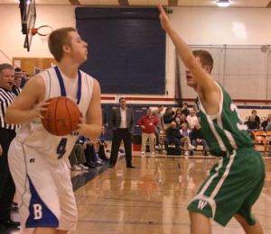 With Bothell High coach Ron Bollinger looking on in the background