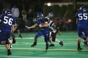 Bothell High's Colby Burk cuts up the middle of the field on his way to a 52-yard touchdown run against Bethel High.