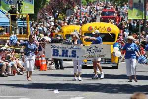 Members of Bothell High's 'Golden Class' of 1961 march in the 4th of July Grand Parade.