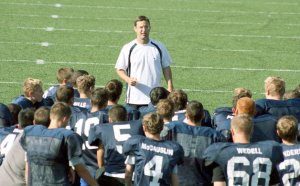 New Cedar Park Christian head football coach Bill Marsh addresses his players at the end of a recent preseason practice at the high school.