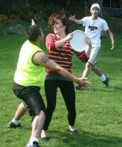 Jesse Trinh guards Cassi Teel during an pickup Ultimate-Frisbee game Oct. 13 on the University of Washington