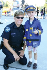 Detective Wilcox with 5-year-old Sofie who wants to be a police officer when she grows up.