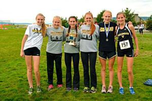 The Inglemoor High School cross country team placed third overall during the Curtis Invitational on Friday. Pictured from left are team members Becca Crawford