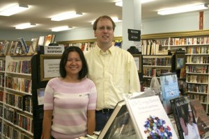 Jason and June Bailey show off the brightly lit interior of the new JJ Books in Bothell's Country Village. The store launched in July.