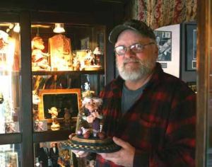 While he constructs Santa figures year-round