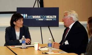 Congresswoman Suzan DelBene meets with members of We Work For Health at Amgen in Bothell on Friday. DelBene starts the talks with former Snohomish County Executive and current Executive Director of the Puget Sound Regional Council Bob Drewel. The round table discussion included executives from local companies and officials from local universities.