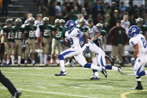 Bothell running back Danny Wilson scampers 59 yards to the end zone during the team's game against Redmond High School Friday. Bothell won the game 35-7.