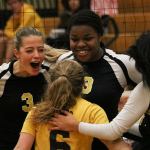 The Inglemoor High volleyball team cheers after winning a point against Bothell on Oct. 26. JOHN WILLIAM HOWARD/Bothell-Kenmore Reporter