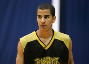 Inglemoor High's Benji Bryant surveys the court during practice.