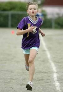 West Hill Elementary fourth-grader Sierra Myers finishes first at the Western Division Elementary Cross Country Finals Oct. 15 at Lockwood Elementary.
