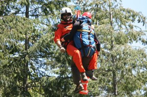 A deputy hoists a mock injury victim to safety during a recent King County Sheriff’s Office Search and Rescue training session. AARON KUNKLER/Reporter Newspapers
