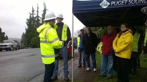 PSE officials and Kenmore City Council members meet near circuit 26 last winter. Reporter File Photo