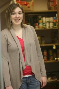 Becky Kent stands outside the food-bank pantry at Cedar Park Northshore Church in Kenmore.
