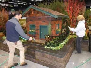 Bothell's James Sprague of the Fancy Plants Gardens landscape company and volunteers put the finishing touches on 'Run