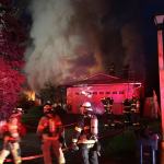 Five departments, including Bothell Fire and E.M.S., responded to this house fire in Bothell on Monday evening. Photo courtesy of the Bothell Police Department