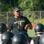 DJ Baddeley talks with the Inglemoor High football team during preseason workouts in August, 2016. Baddeley stepped down from his position as head coach on Friday, Nov. 18. JOHN WILLIAM HOWARD/Bothell-Kenmore Reporter