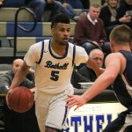 Bothell senior Cameron Tyson (5) surveys the defense during the Cougars&rsquo; win over Juanita in the seaon opener on Nov. 28. Tyson was among the conference leaders in scoring last winter. JOHN WILLIAM HOWARD/Bothell-Kenmore Reporter