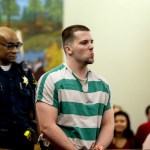 Jacob Tusken is led into Snohomish County Superior Court Monday to be sentenced for the first-degree assault of his own infant daughter. The child is left with permanent brain injuries and will require constant care for life. DAN BATES/The Herald