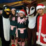 More than 65 students from Inglemoor and Bothell High Schools volunteered during the event. Five Inglemoor students are decked out in seasonal costumes provided by the Northshore Rotary.