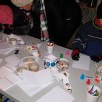 Local kids work on arts and crafts during the festival.