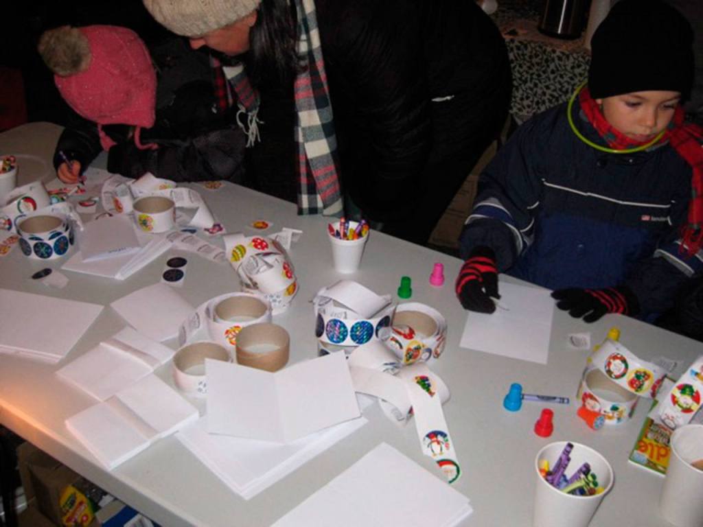 Local kids work on arts and crafts during the festival.