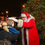 Santa received a festive welcome from the Inglemoor High School cheerleaders. Heston Photography