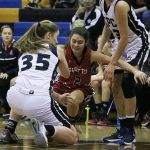 Cedar Park&rsquo;s Sela Flynn (35) and Irena Korolenko (23) battle Seattle Christian&rsquo;s Alexis Bates for a loose ball in the first half of Tuesday&rsquo;s loss at Cedar Park Christian School in Bothell. JOHN WILLIAM HOWARD/Bothell-Kenmore Reporter