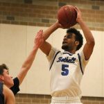 Bothell guard Cameron Tyson shoots over Juanita&rsquo;s Ryan Trautmann during the first half Thursday&rsquo;s game at Bothell High School. Tyson finished with a game-high of 28 points. JOHN WILLIAM HOWARD/Bothell-Kenmore Reporter