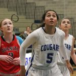 Bothell senior Taya Corosdale (5) boxes out Juanita&rsquo;s Brittany White (2) in the first half of Friday&rsquo;s nonconference win at Bothell High School. Corosdale scored 28 in the victory for Bothell. JOHN WILLIAM HOWARD/Bothell-Kenmore Reporter