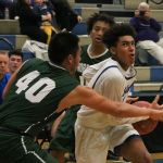Bothell junior Da&rsquo;Vicious Wilson splits a pair of defenders in the second half of the Cougars&rsquo; loss to Shorecrest on Dec. 30. Wilson finished with nine points, all in the second half. JOHN WILLIAM HOWARD/Bothell-Kenmore Reporter