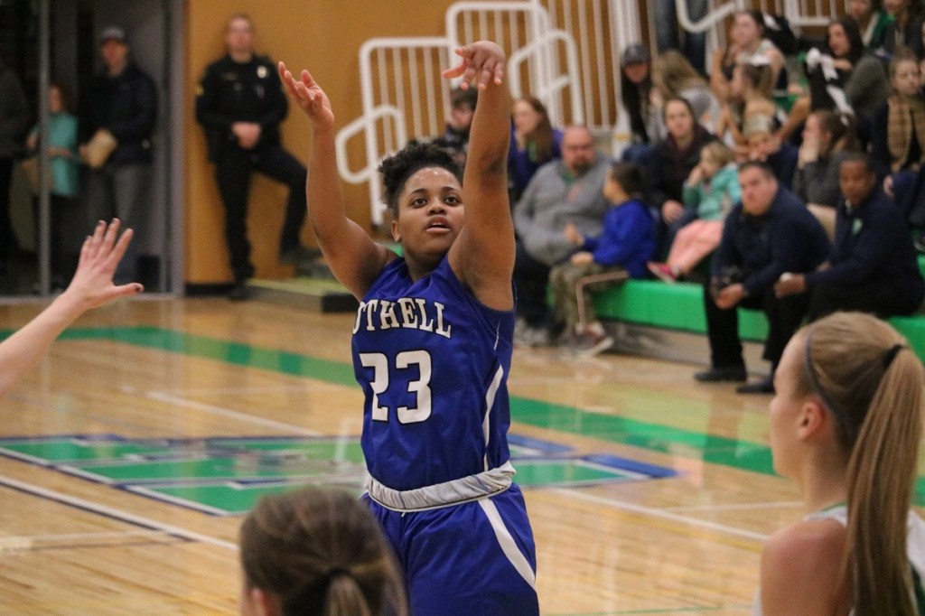 Bothell senior Jada Romulus finished with eight points and played a big role bringing the ball up the floor in the Cougars&rsquo; win over Woodinville on Jan. 6. JOHN WILLIAM HOWARD/Bothell-Kenmore Reporter