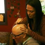 Kirkland artist Sarah Walters creates a henna crown for Mary Glasco at Sankara Imports in Bothell. CATHERINE KRUMMEY/Kirkland Reporter